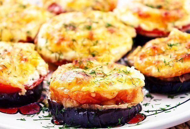 "Eggplant with tomatoes and mushrooms" dish